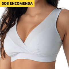 Sutiã Rantelli DeMillus (061227). Em elastano power com compressão e detalhes transparentes. Taças forradas, sem aro e sem espuma. Alças largas, sem regulagem, tipo camisete. Cores: branco, preto e bege. Tamanhos: 44, 46, 48, 50, 52 e 54.