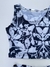 CONJUNTO POLLERA Y TOP FLOR FONDO AZUL en internet