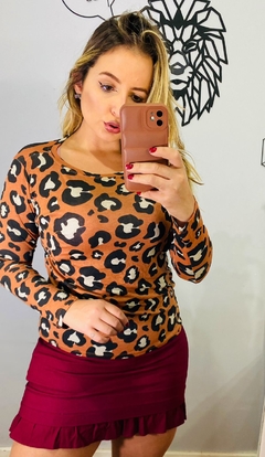 Blusa manga longa estampa onça