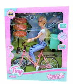 Muñeca Articulada Tiny Viajera con Bicicleta