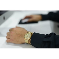 Relógio analógico automático Orient EM03-A0F Unissex dourado - comprar online