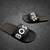 CHINELO SLIDE HUGO BOSS ( com defeito) cod 02010