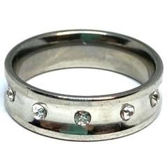 Anillo cinta de acero de 6mm con cubics frontales color transparente nro 30