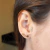 Piercing conch infinito cravejado