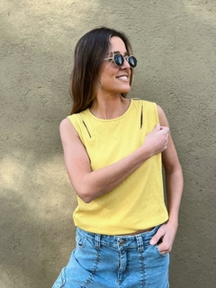 Musculosa con huecos