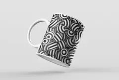 Caneca com design de bolas abstratas em preto e branco, ideal para decoração moderna.