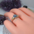 Imagen de AN 074 Anillo Plata y Oro modelo frutilla con cubics azul