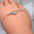 PP 107 Pulsera de Plata con carita de nene Plata y Oro