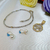 PR 002 Pack Pulsera redonda, dije arbol y aros perlas con strass - comprar online
