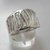 AN 063 Anillo macizo ancho de plata con relieve