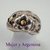 AN 143 Anillo macizo pesado Plata con Oro con flores. - comprar online