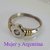 AN 226 Anillo Plata con oro flor con cubics central en internet