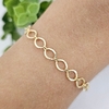 Pulseira elos ovais com detalhes banhada a ouro 18k