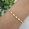 Bracelete torcido banhado a ouro 18k