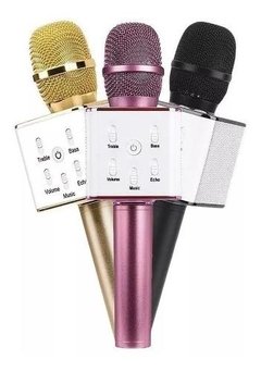 Micrófono karaoke con parlante integrado.