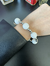 Pulsera bolones blancos con gancho marinero de acero quirúrgico - comprar online