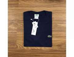 Camiseta Lacoste Lisa Camiseta Lacoste Lisa - Azul Marinho com logo verd...- Azul Marinho com logo verd... - comprar online