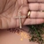 Cl 0245-1: Colar crucifixo cravejado