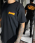 CAMISETA NEGRA THRASHER VANS FUEGO