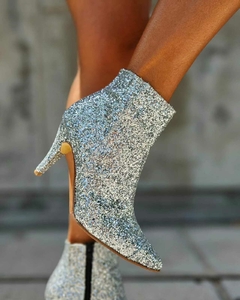 RIHANA GLITTER PLATA en internet