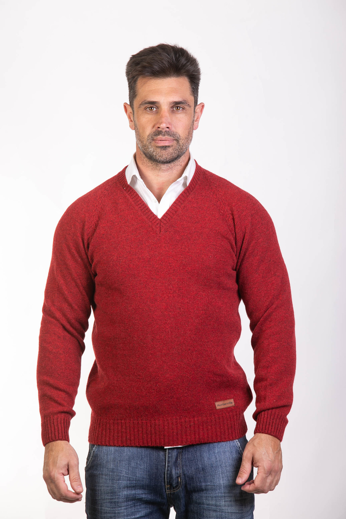 Suéter de lana merino con cuello en V para hombre